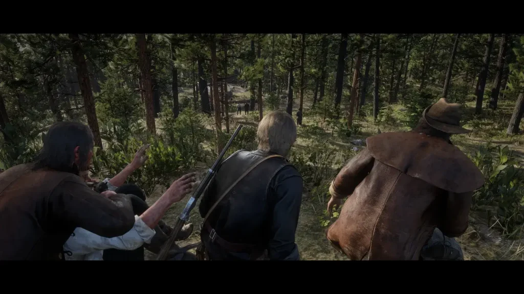 Arthur Morgan with a group of characters moving through a dense forest in Red Dead Redemption 2