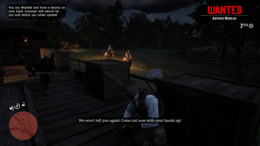 Lawmen chasing Arthur Morgan during a wanted scene at night in Red Dead Redemption 2