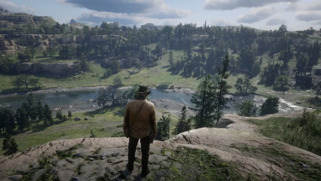 Arthur Morgan overlooking a large open world landscape showing map scale in Red Dead Redemption 2