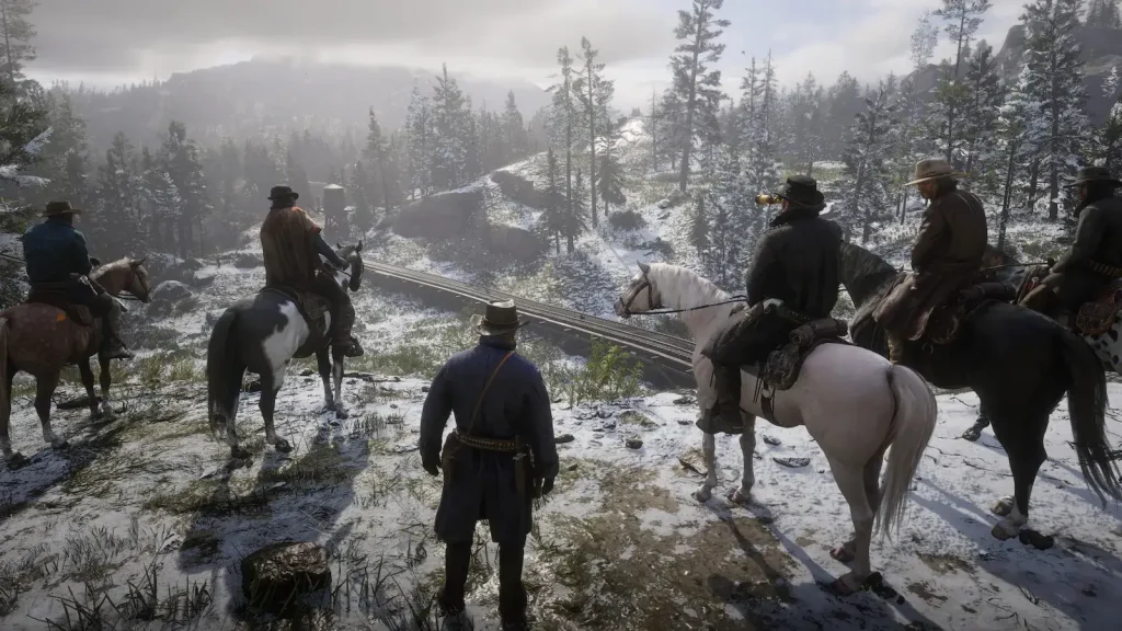 Arthur Morgan with gang members overlooking a snowy landscape in Red Dead Redemption 2