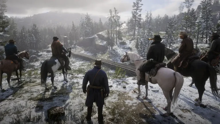 Arthur Morgan with gang members overlooking a snowy landscape in Red Dead Redemption 2