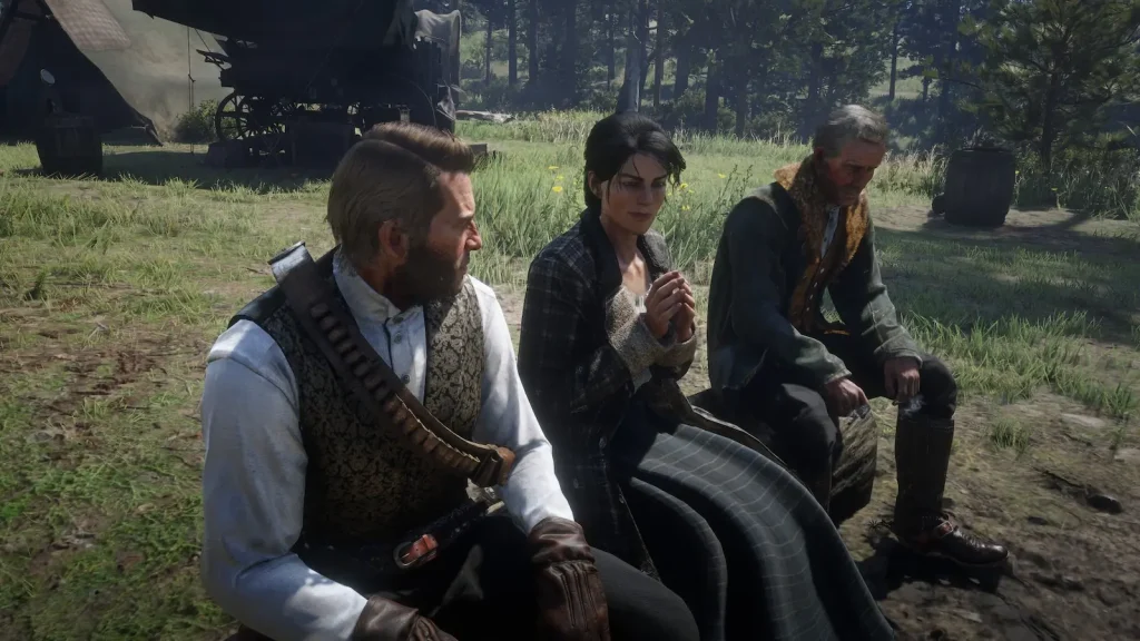 Arthur Morgan sitting with gang members at camp from a side view in Red Dead Redemption 2